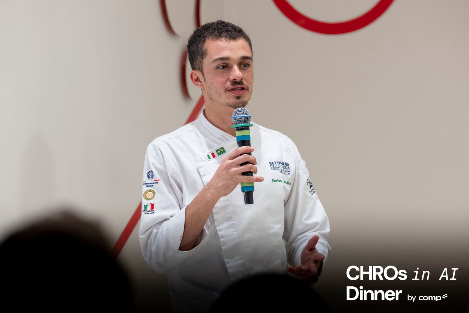 Chef presenting the community dinner menu