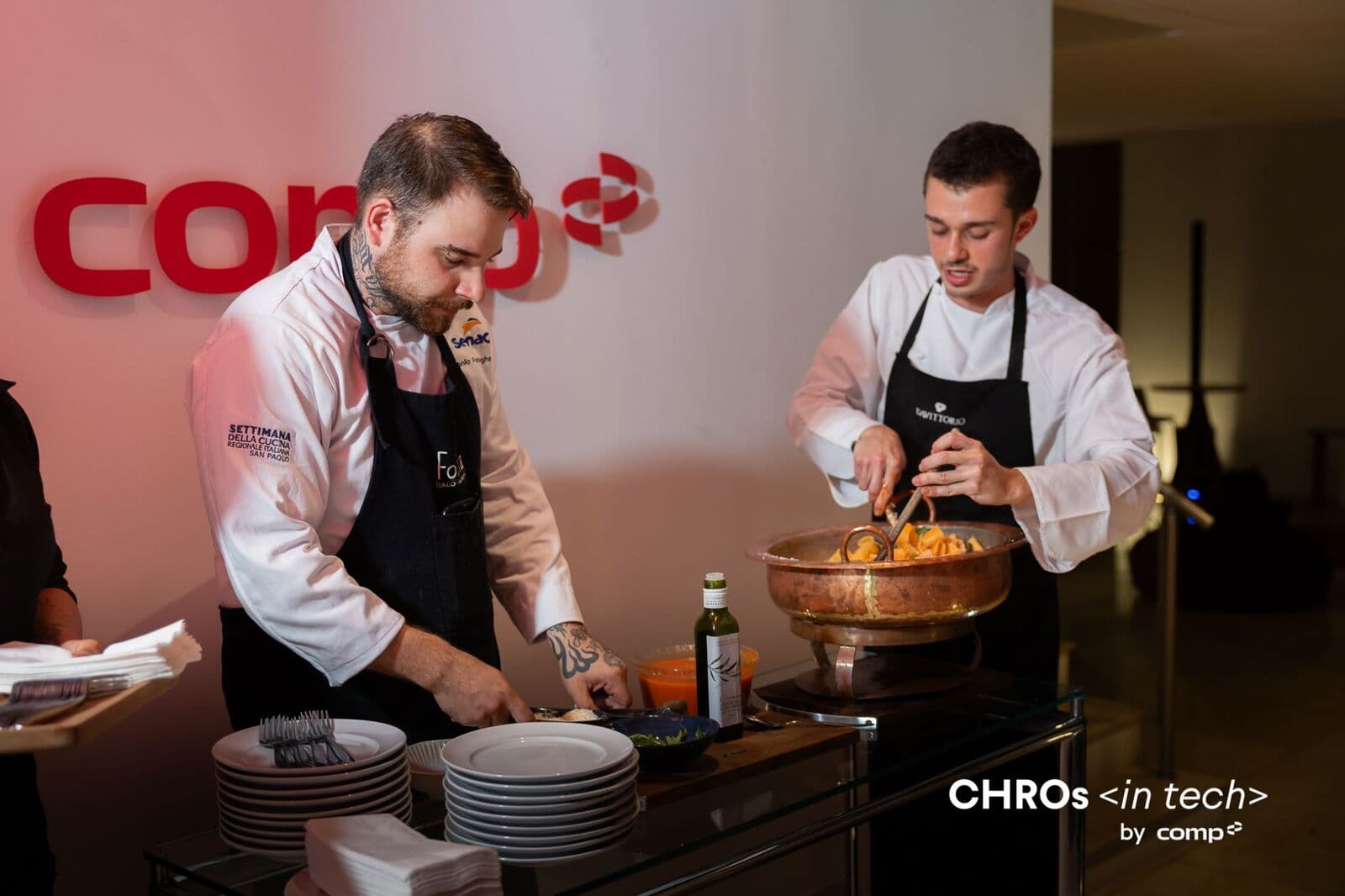 Chefs plating the dinner's dishes