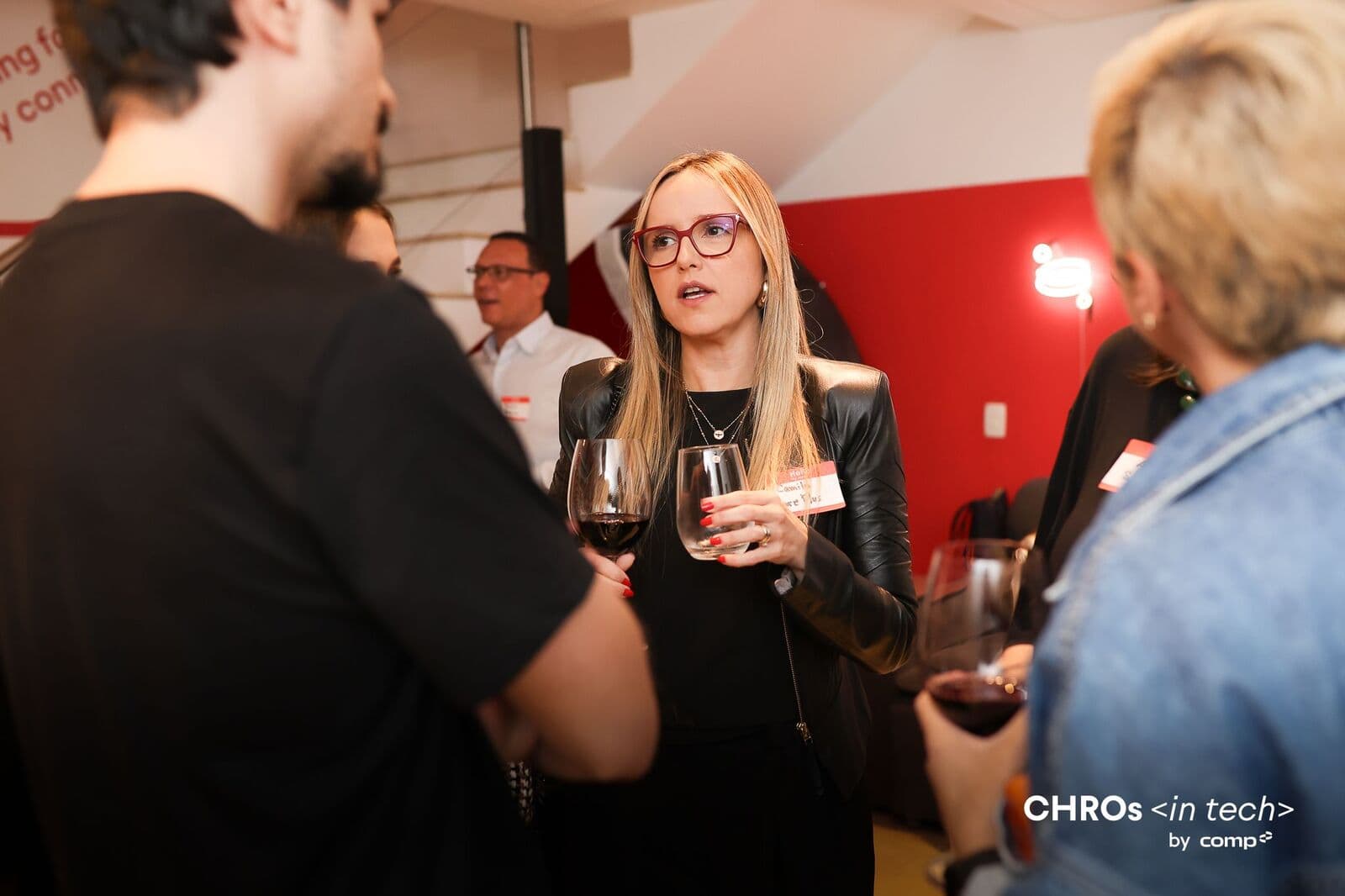 Networking with a glass of wine during the dinner