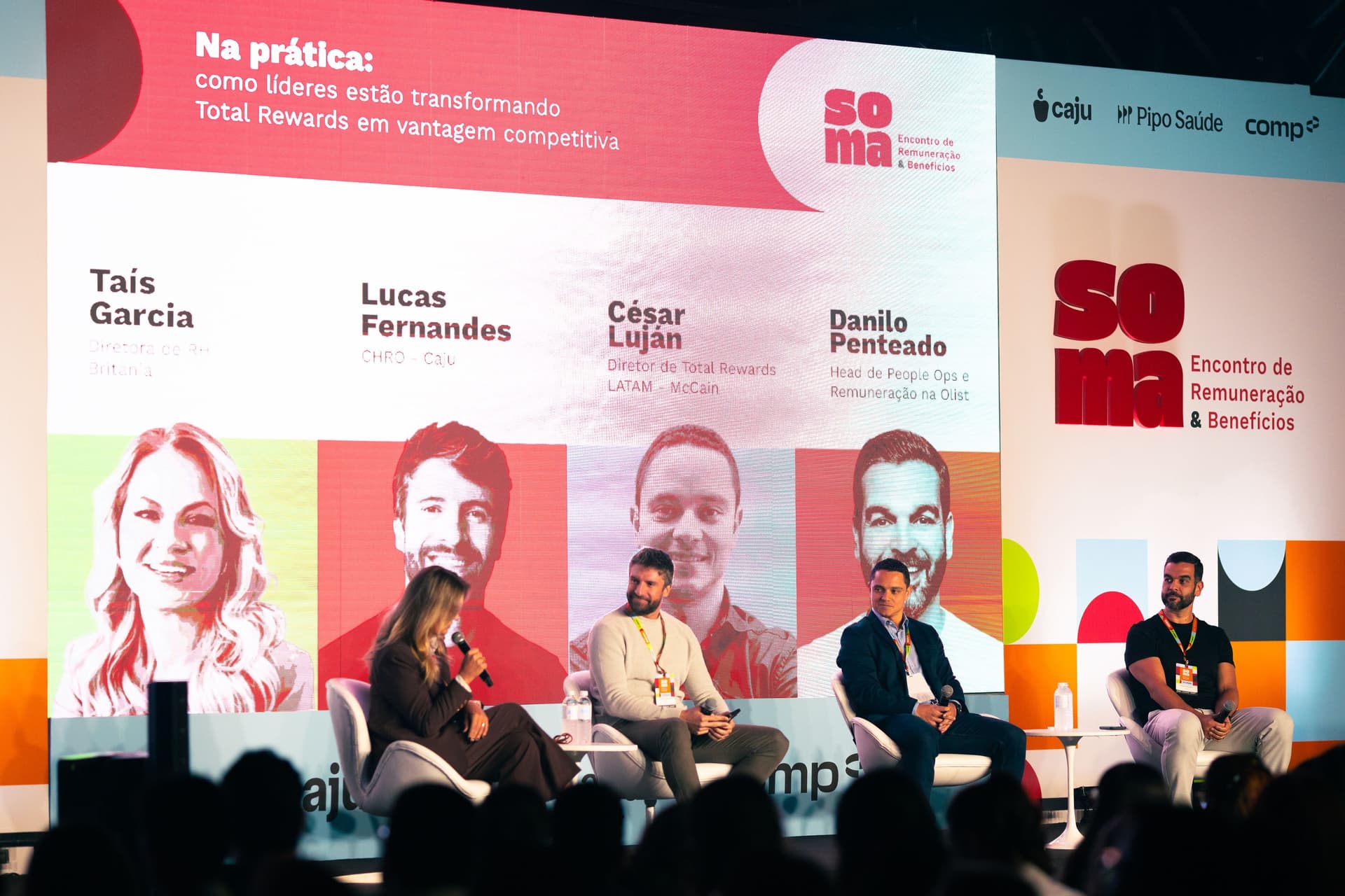 Painel da Caju no palco do SOMA 2026