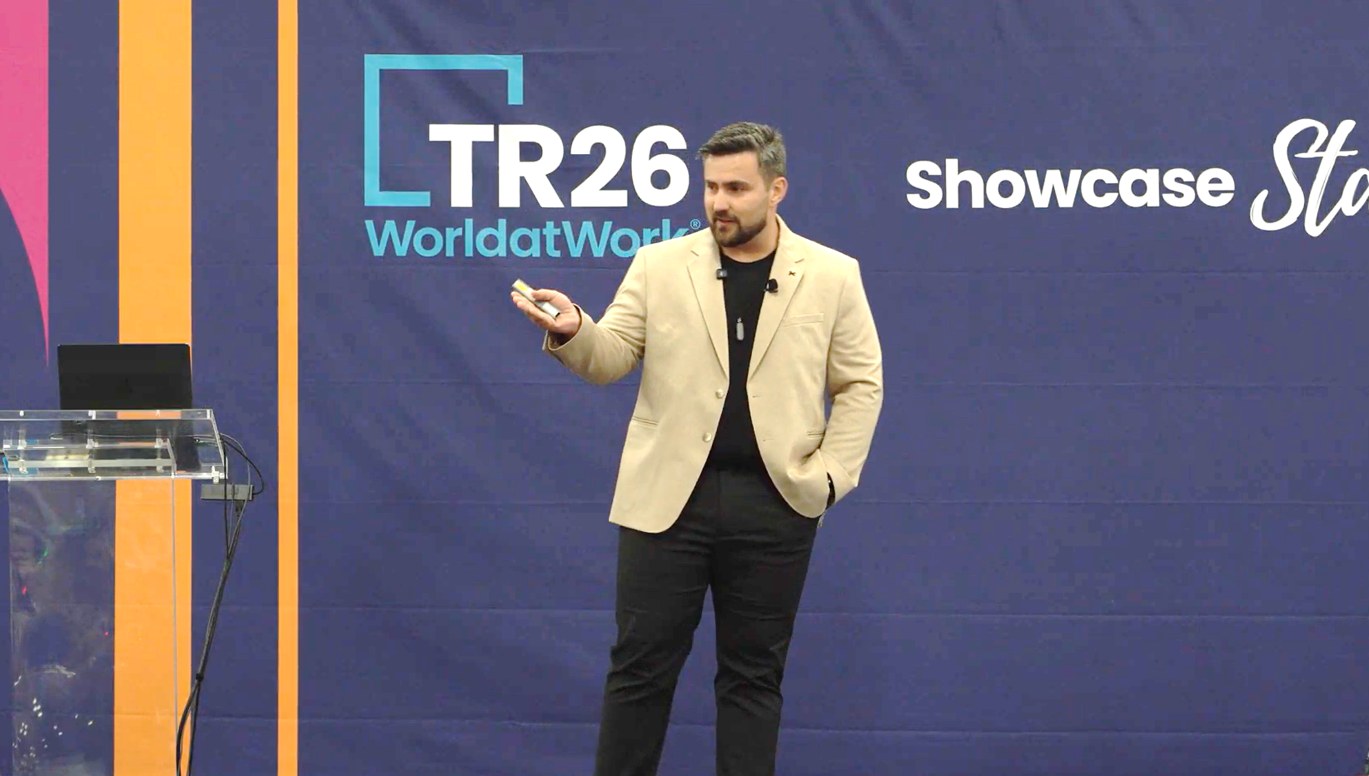 Guilherme Tomazin on stage at Total Rewards'26